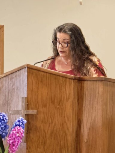 Athena Teaching from the pulpit during the native American Outreach